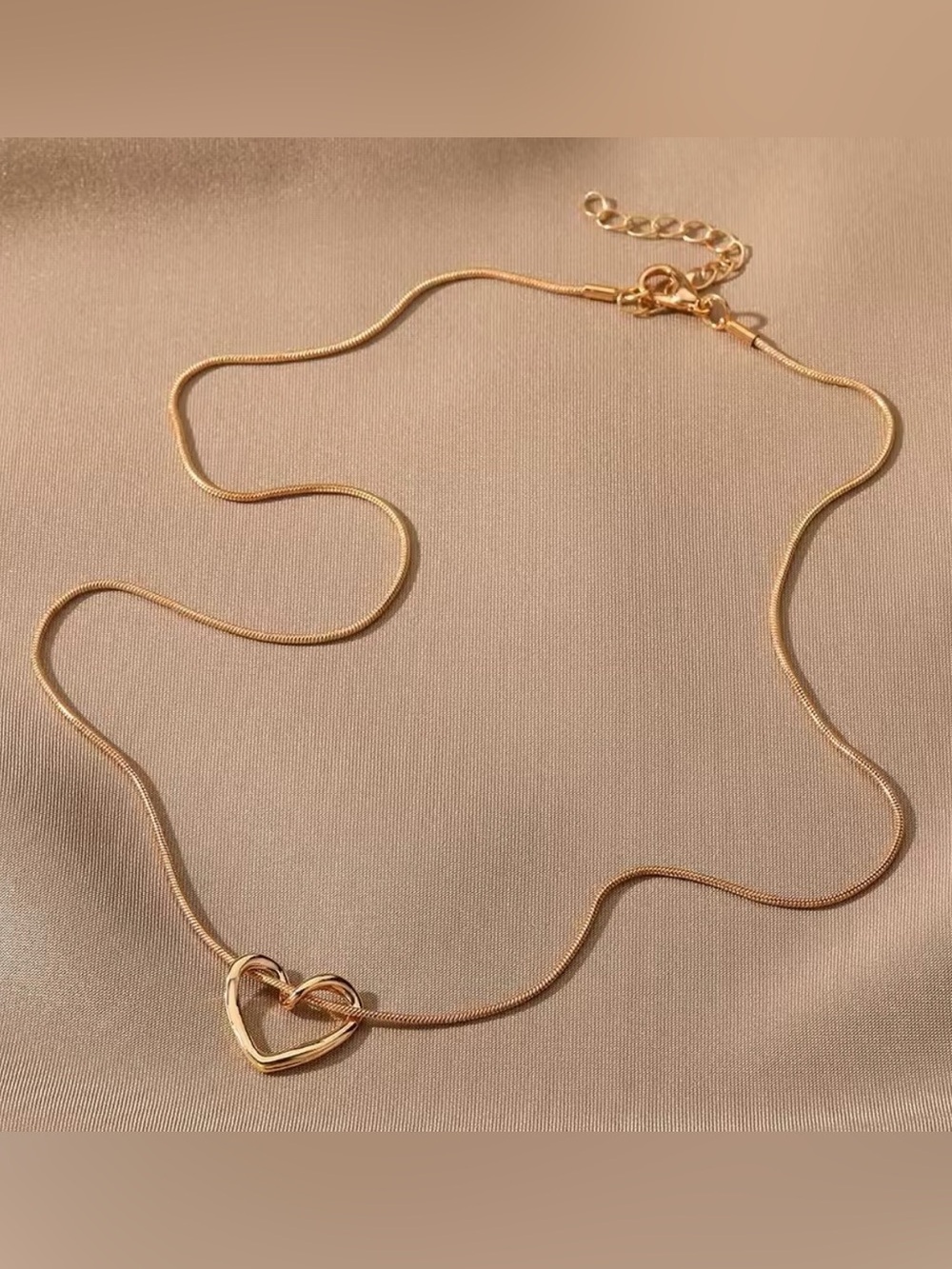 Gold Heart Knot Pendant Necklace